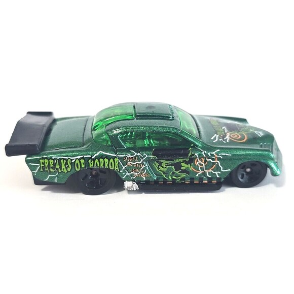 Hot Wheels 1998 Freaks of Horror At-A-Tude Green Metalflake with Graphics 1:64 - Picture 2 of 6